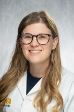 Dr. Killoran, a woman in a white coat and glasses.