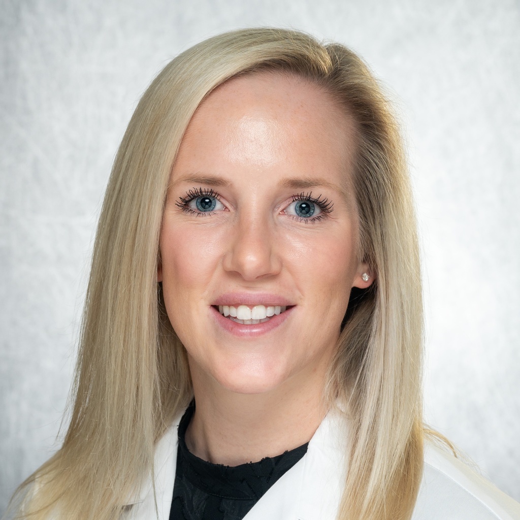 Dr. Jansen, a blonde woman in a white coat.