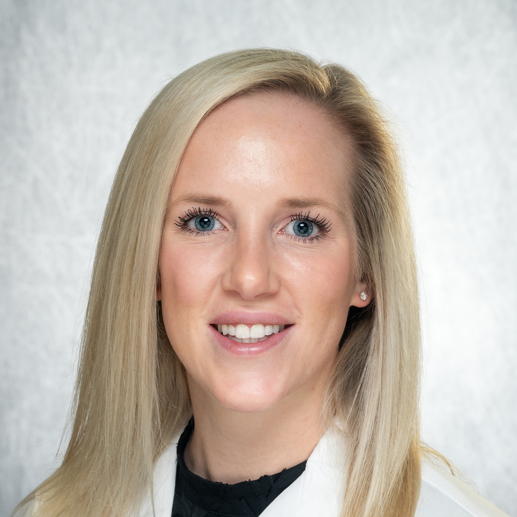 Dr. Jansen, a blonde woman in a white coat.